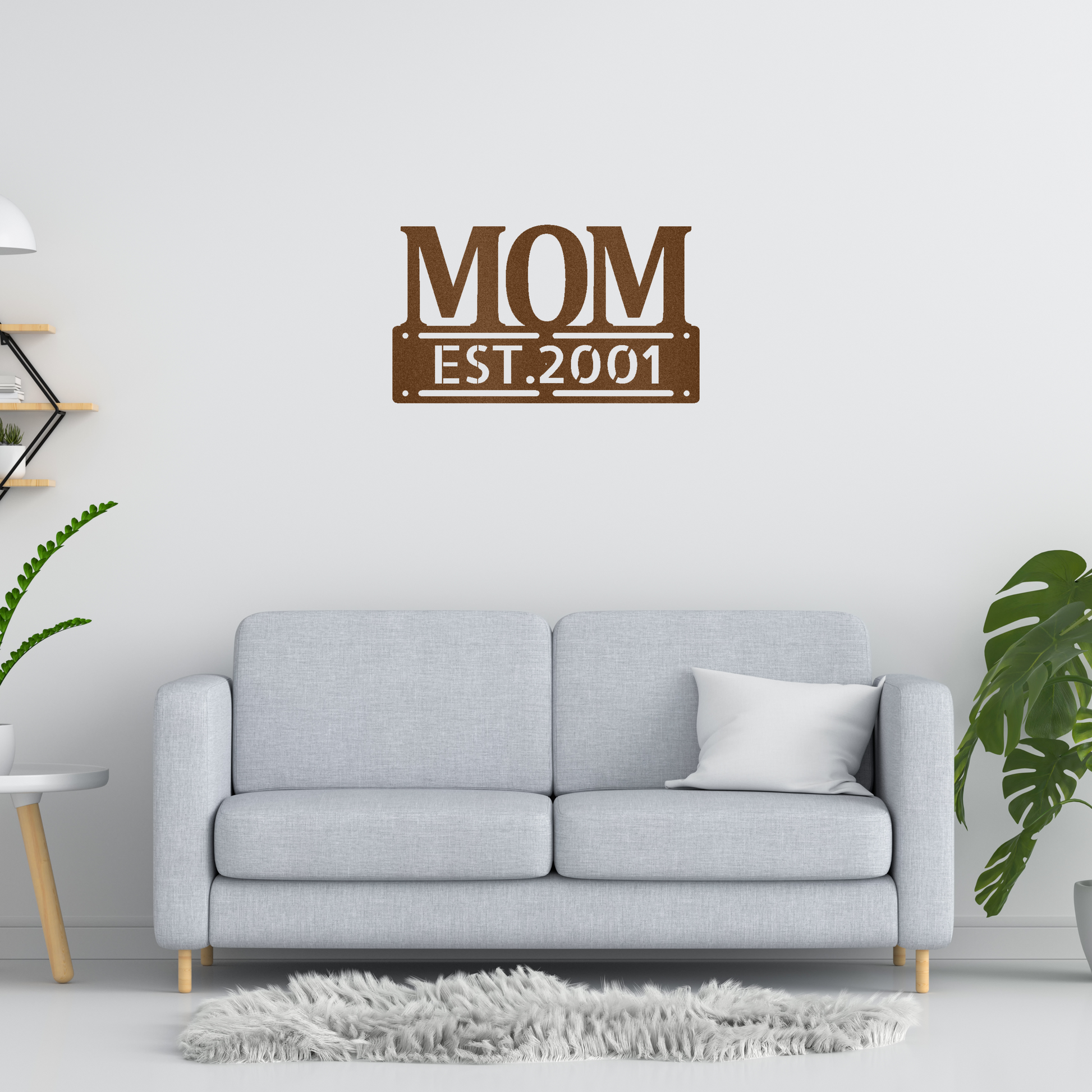 scripted MOM plaque with personalized  date of motherhood, powder coated copper finish metal wall decor, hanging on a white wall over a grey sofa | Home Accent Studio