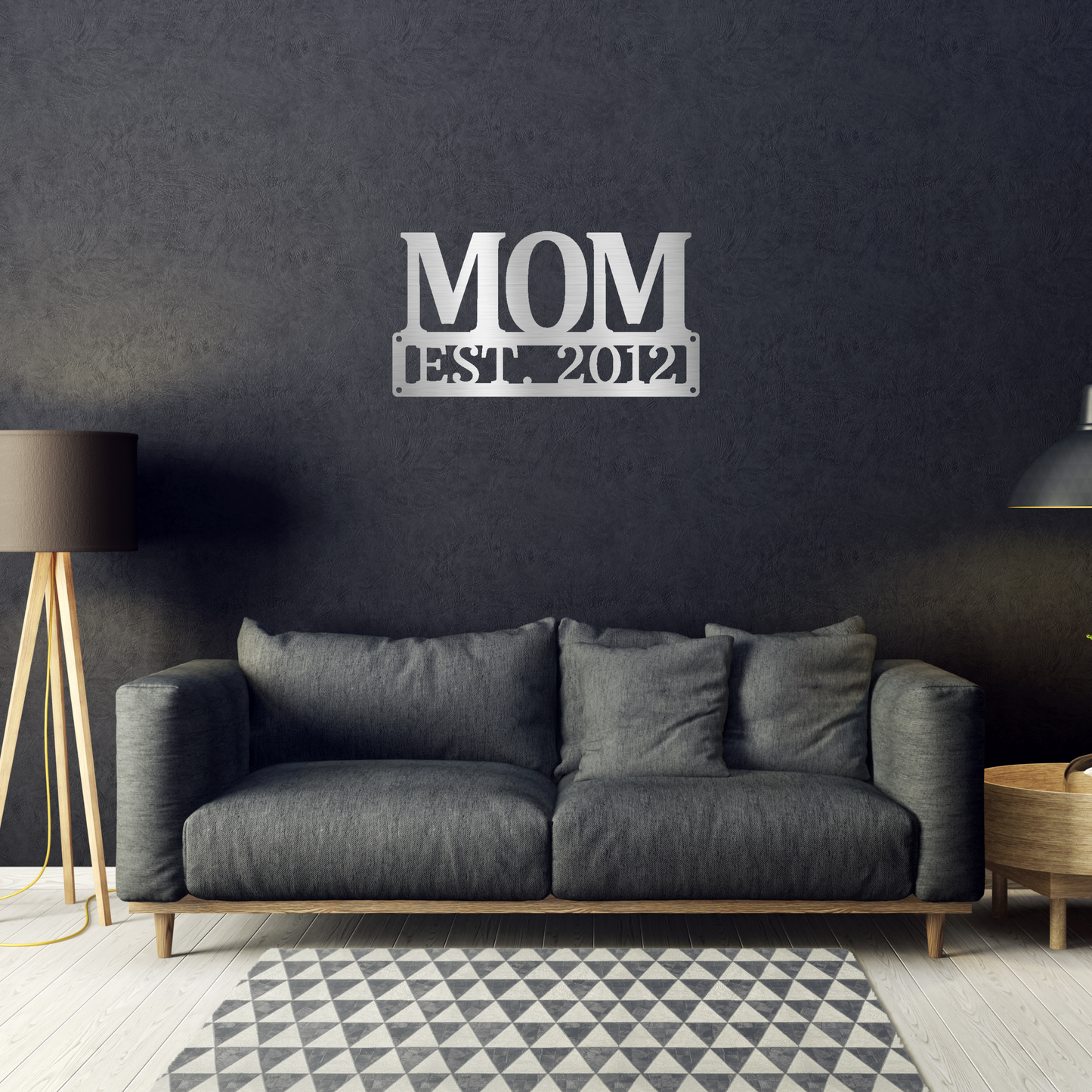 scripted MOM plaque with personalized  date of motherhood, powder coated silver finish metal wall decor,  hanging on a black wall over a black sofa | Home Accent Studio